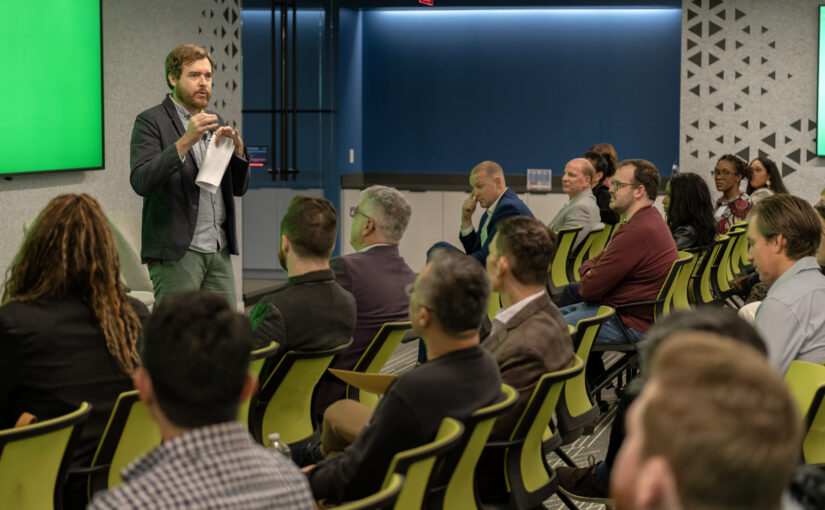 Chris Wink speaking to audience